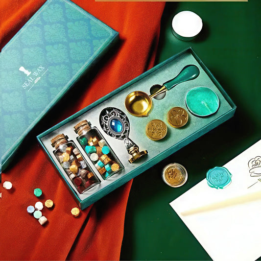 Decorative wax sealing kit with various components on a green and red background
