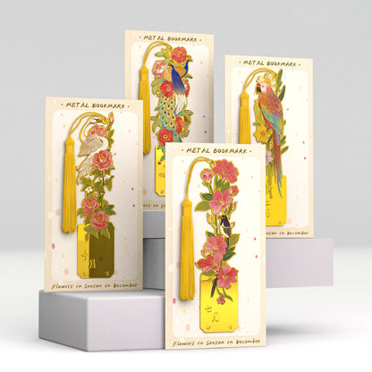 Metal bookmarks with floral and bird designs in packaging