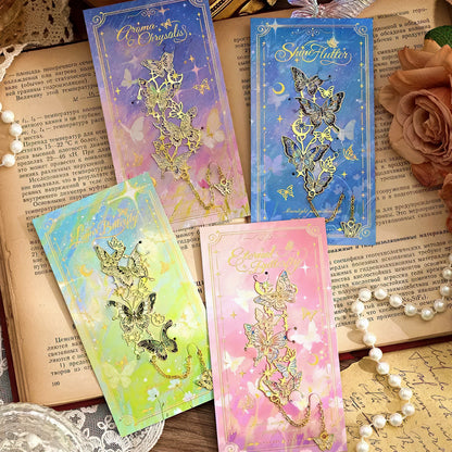 Set of four decorative bookmarks with butterfly designs on an old book background.