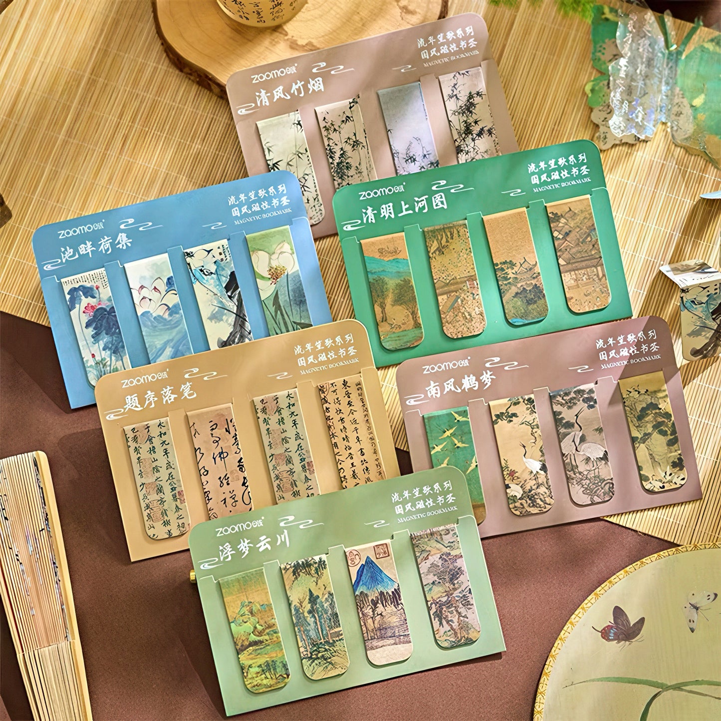 Set of magnetic bookmarks in packaging on a wooden surface