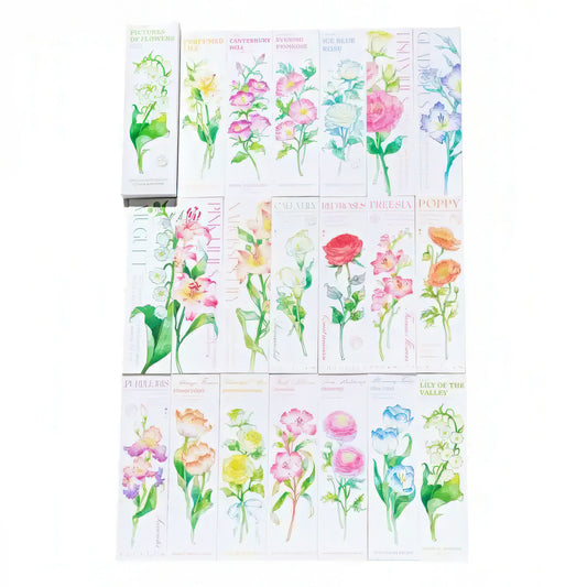 Set of paper bookmarks with various flower designs on a white background