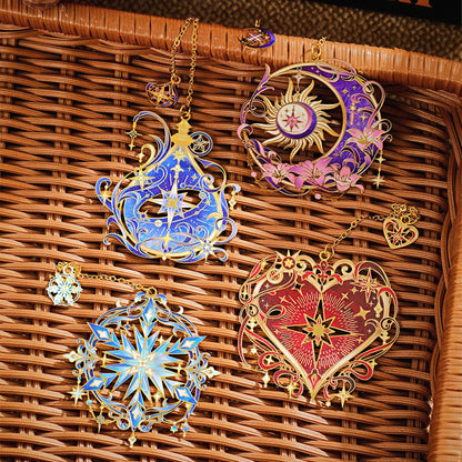 Set of four intricate floral and stars themed metal bookmarks on a woven basket.