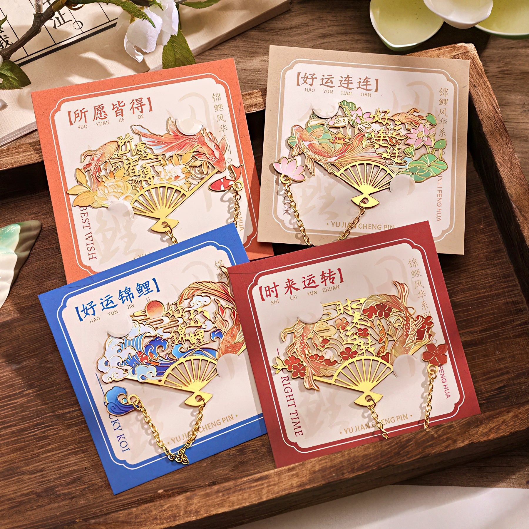 Decorative bookmarks with intricate designs on colorful cards.