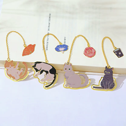Set of cat-shaped bookmarks on a white background