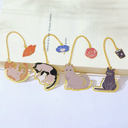Set of cat-shaped bookmarks on a white background