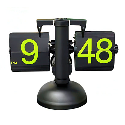 Black flip clock with green numbers on a white background