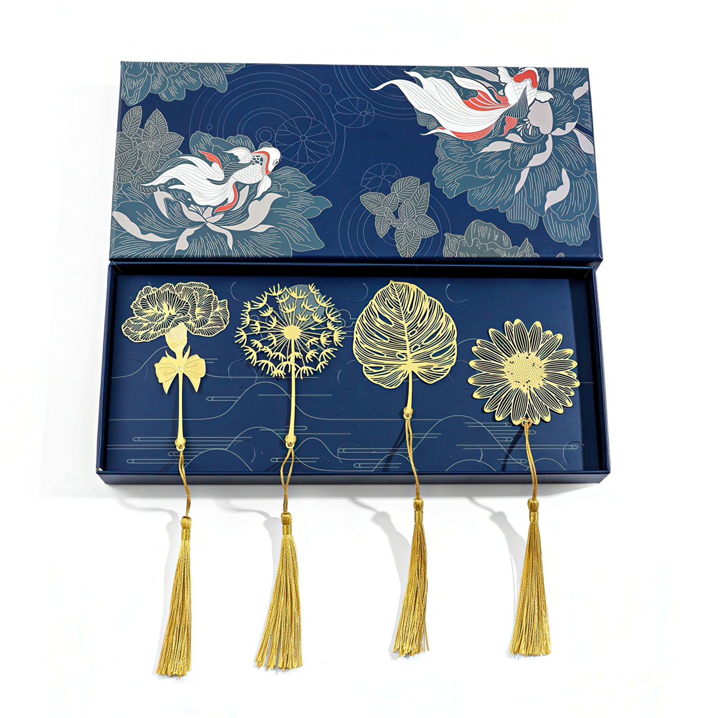 Gold metal bookmark with floral designs and tassels in a blue box.