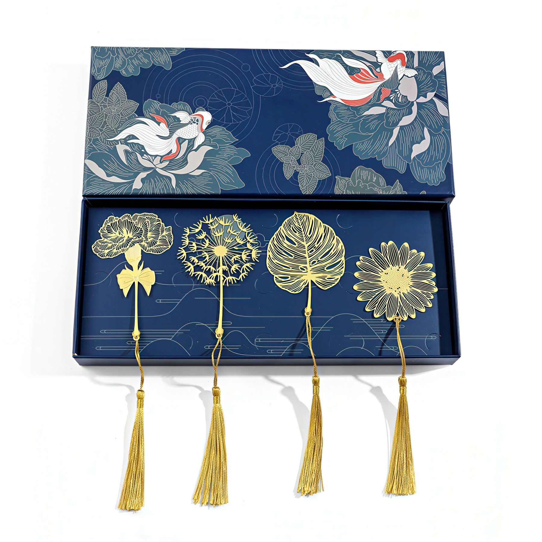 Gold metal bookmark with floral designs and tassels in a blue box.