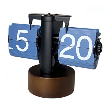 Tabletop clock with blue flip cards displaying hours and minutes on a white background