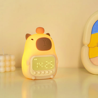 Children's alarm clock with cabubara design on a yellow background