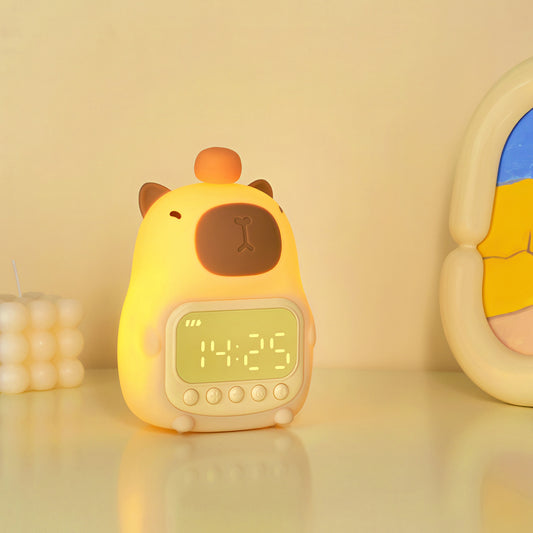 Children's alarm clock with cabubara design on a yellow background