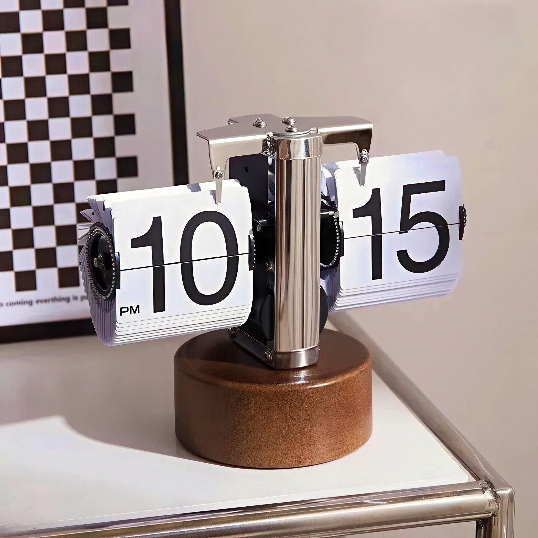 Flip clock with wooden base on a surface