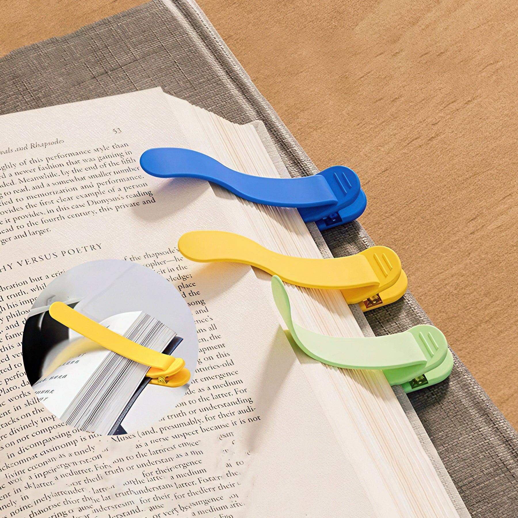 Colorful bookmarks on an open book with a textured surface