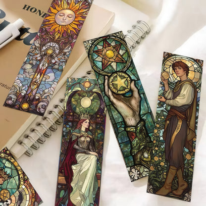 Colorful tarot bookmarks with artistic designs on a white surface