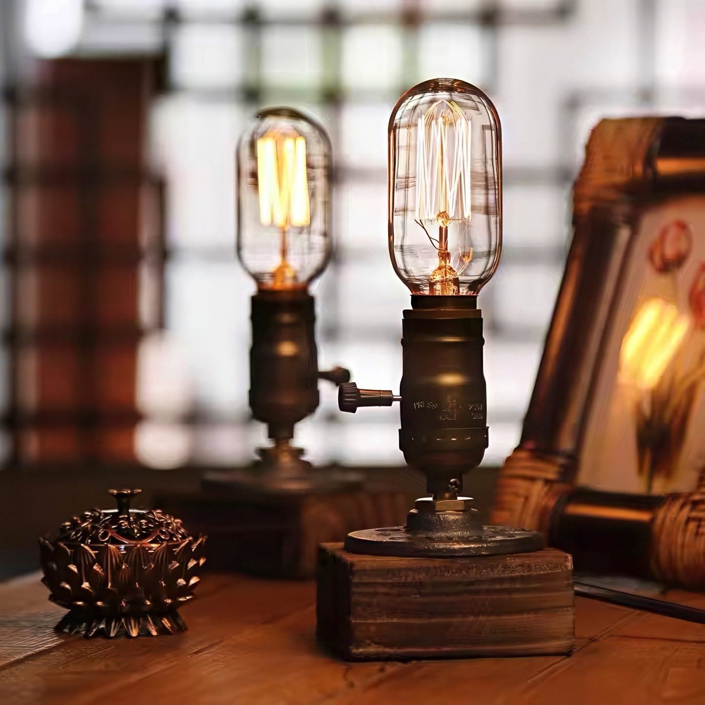 Vintage-style light bulbs on a wooden surface with a blurred background