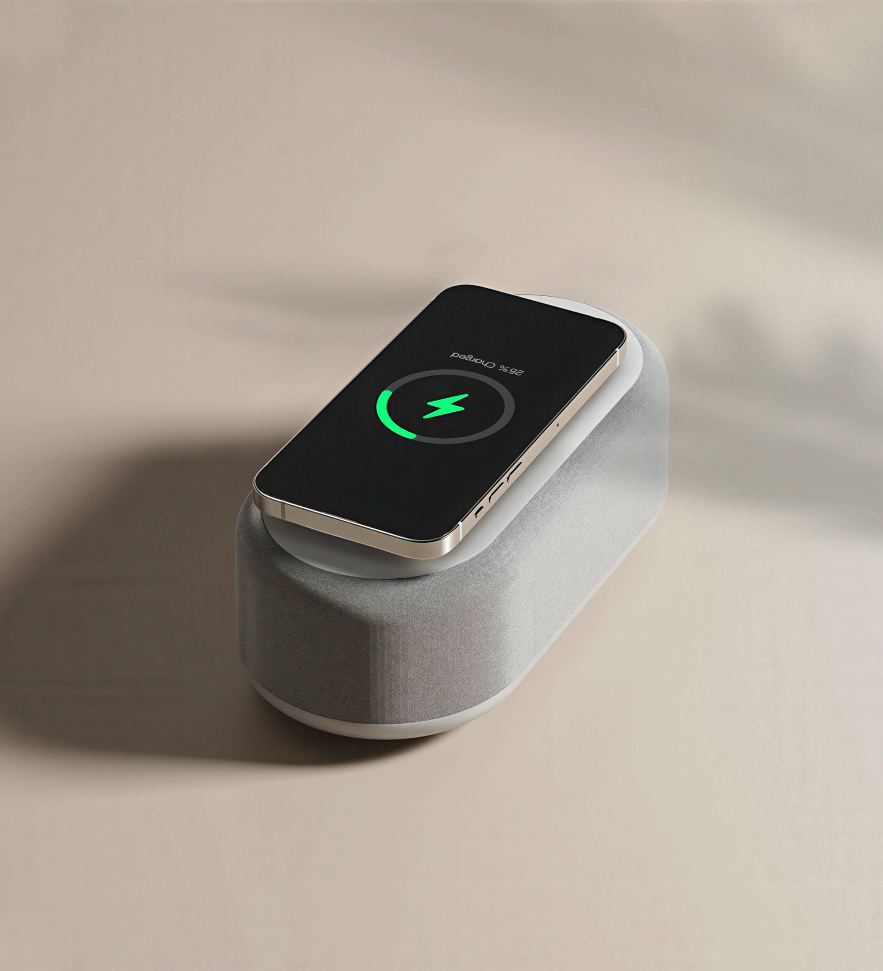 Wireless charging pad with a smartphone on a beige background