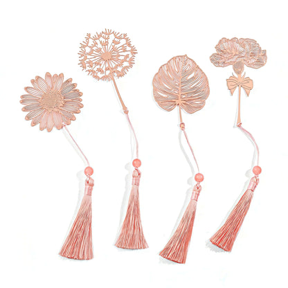 Set of metal bookmarks with floral designs and tassels on a white background