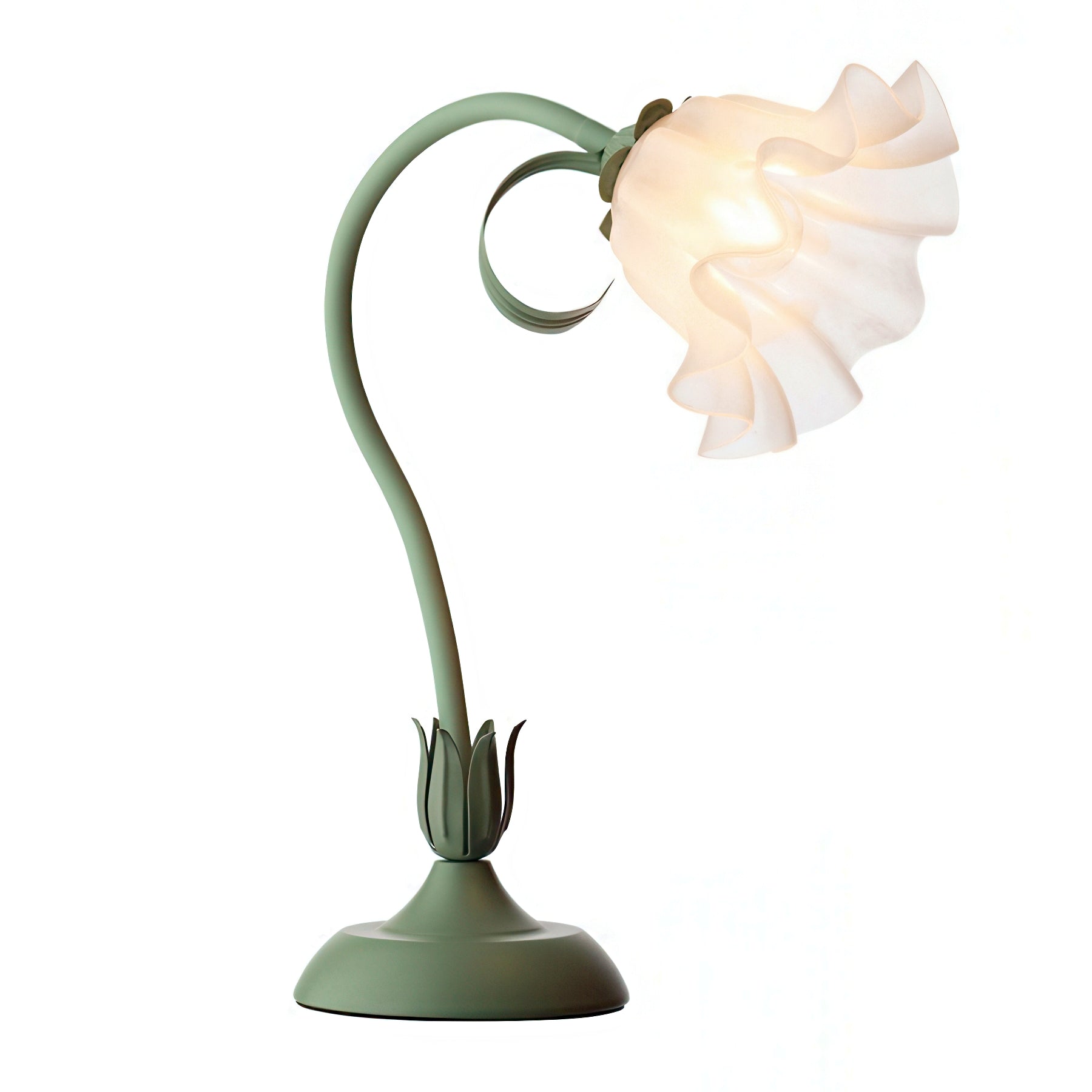 Green floral table lamp on a white surface