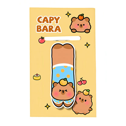 Capybara-themed magnetic bookmark on a white background