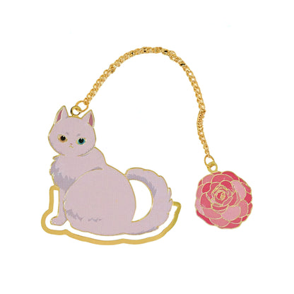 Cat-shaped metal bookmark with gold chain and pink rose charm on a white background