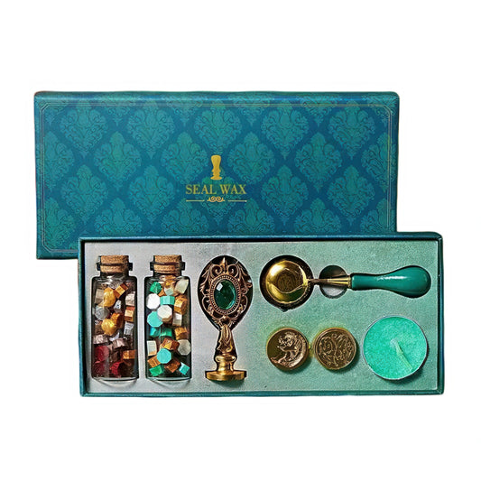 Seal wax kit with jars, stamp, and tools in a decorative box.