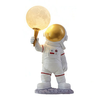 Astronaut figurine holding a moon lamp on a white background