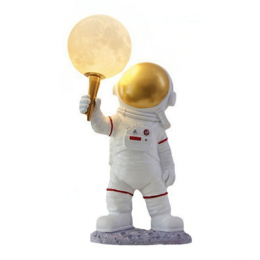 Astronaut figurine holding a moon lamp on a white background