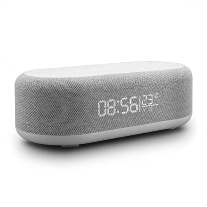 Gray and white rectangular digital clock with wireless charging on a white background